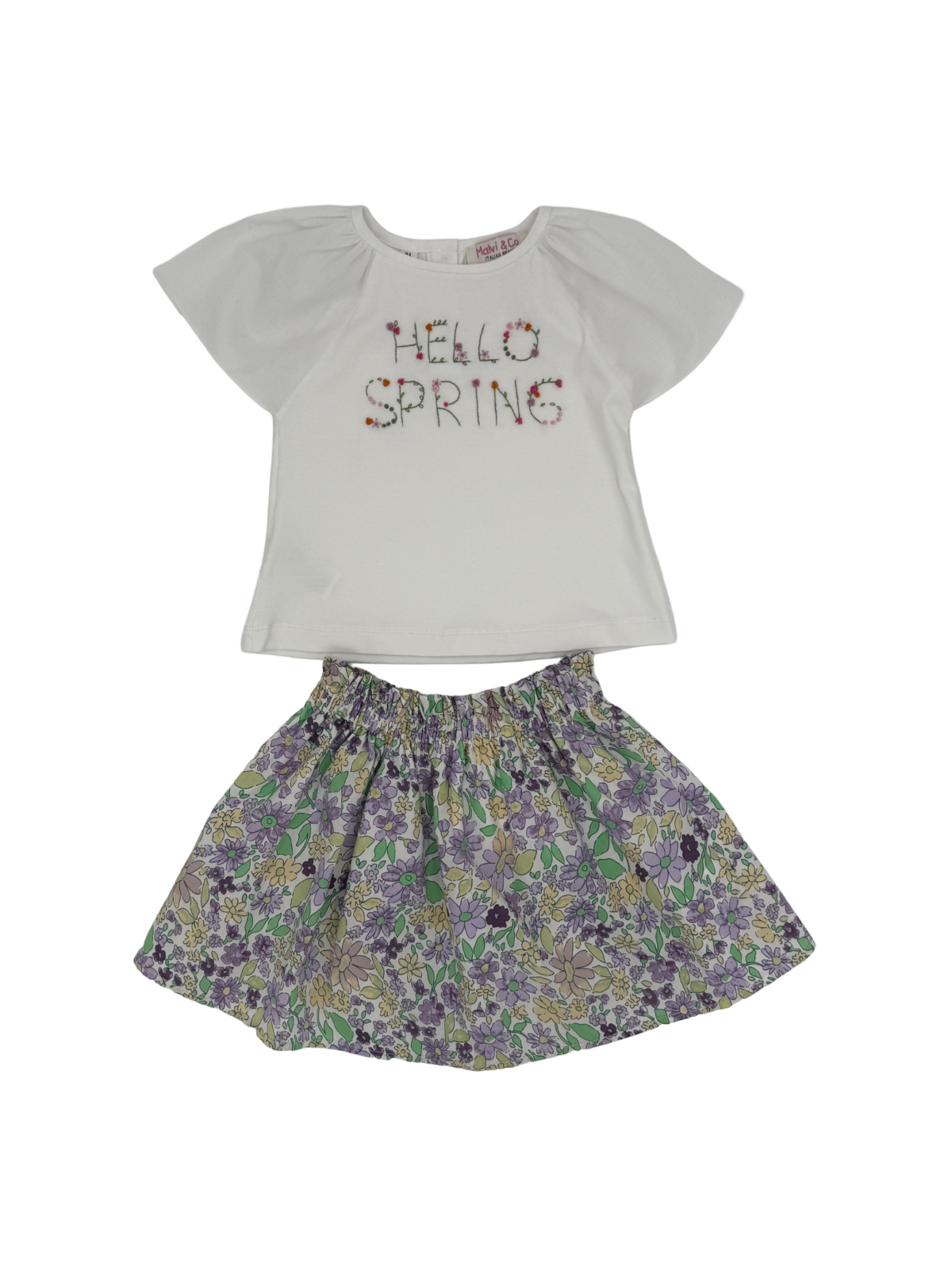 t-shirt con scritta ricamata + gonna in tessuto stampato