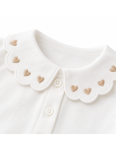 jersey polo with heart embroidery